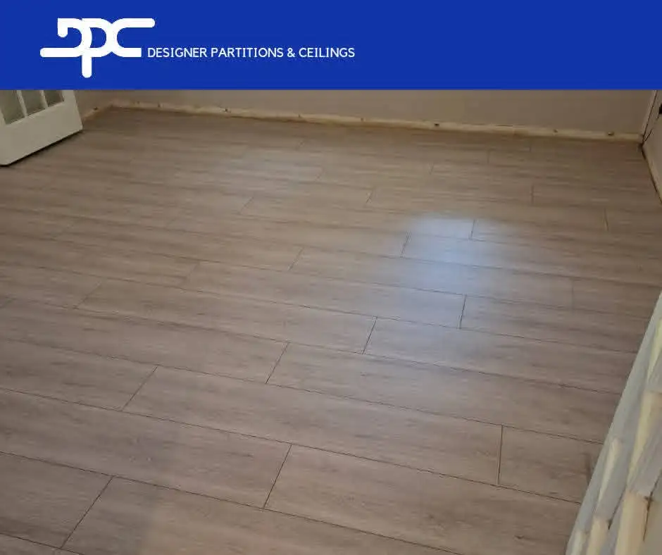 Completed laminated flooring installation in a Cape Town interior